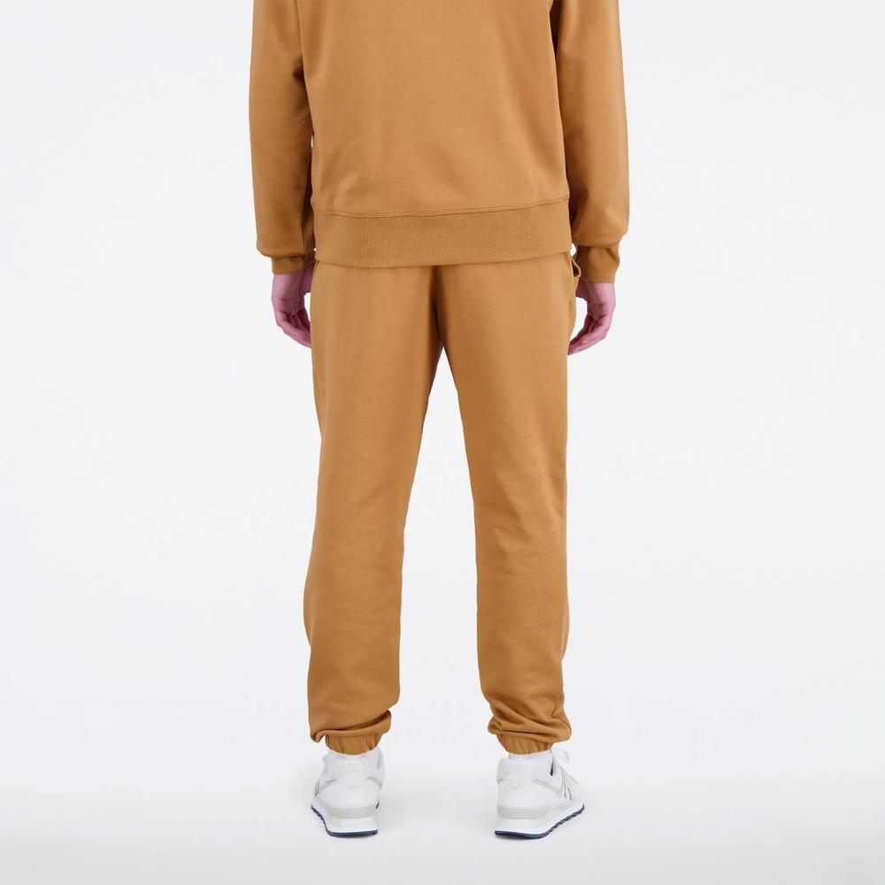 Spodnie New Balance MP31539TOB - brązowe