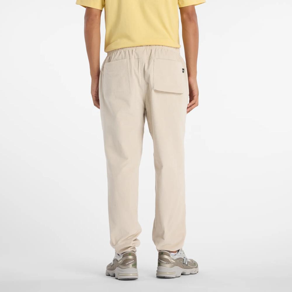 Spodnie męskie New Balance MP53521TWF - beżowe