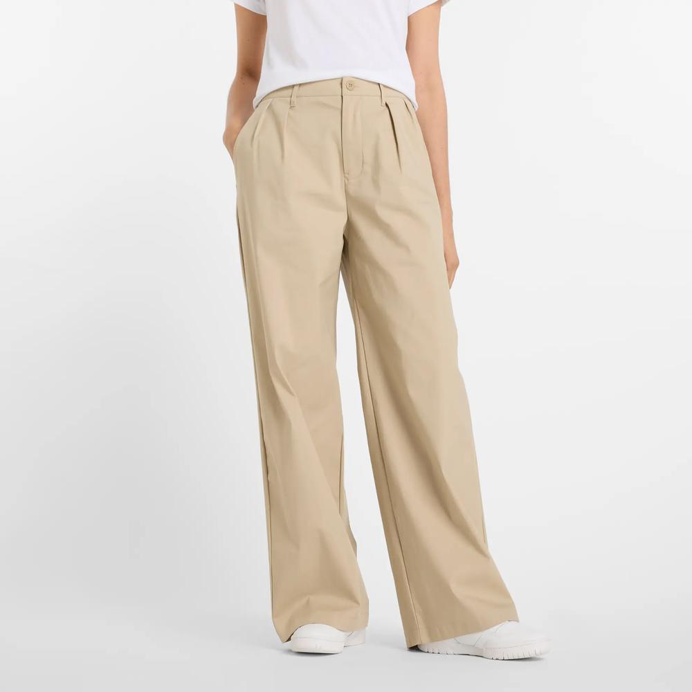 Spodnie damskie New Balance WP51538SOT - beżowe