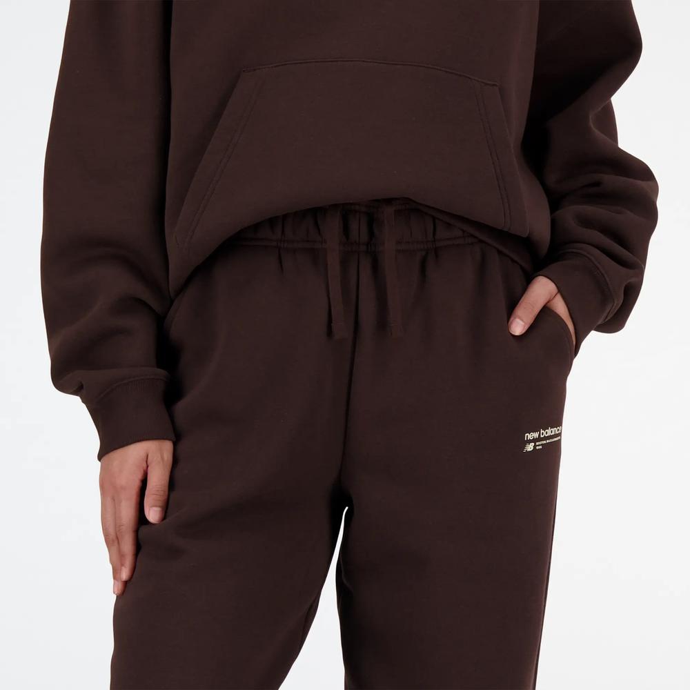 Spodnie New Balance WP33513KCF - brązowe