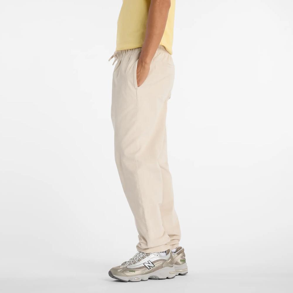 Spodnie męskie New Balance MP53521TWF - beżowe