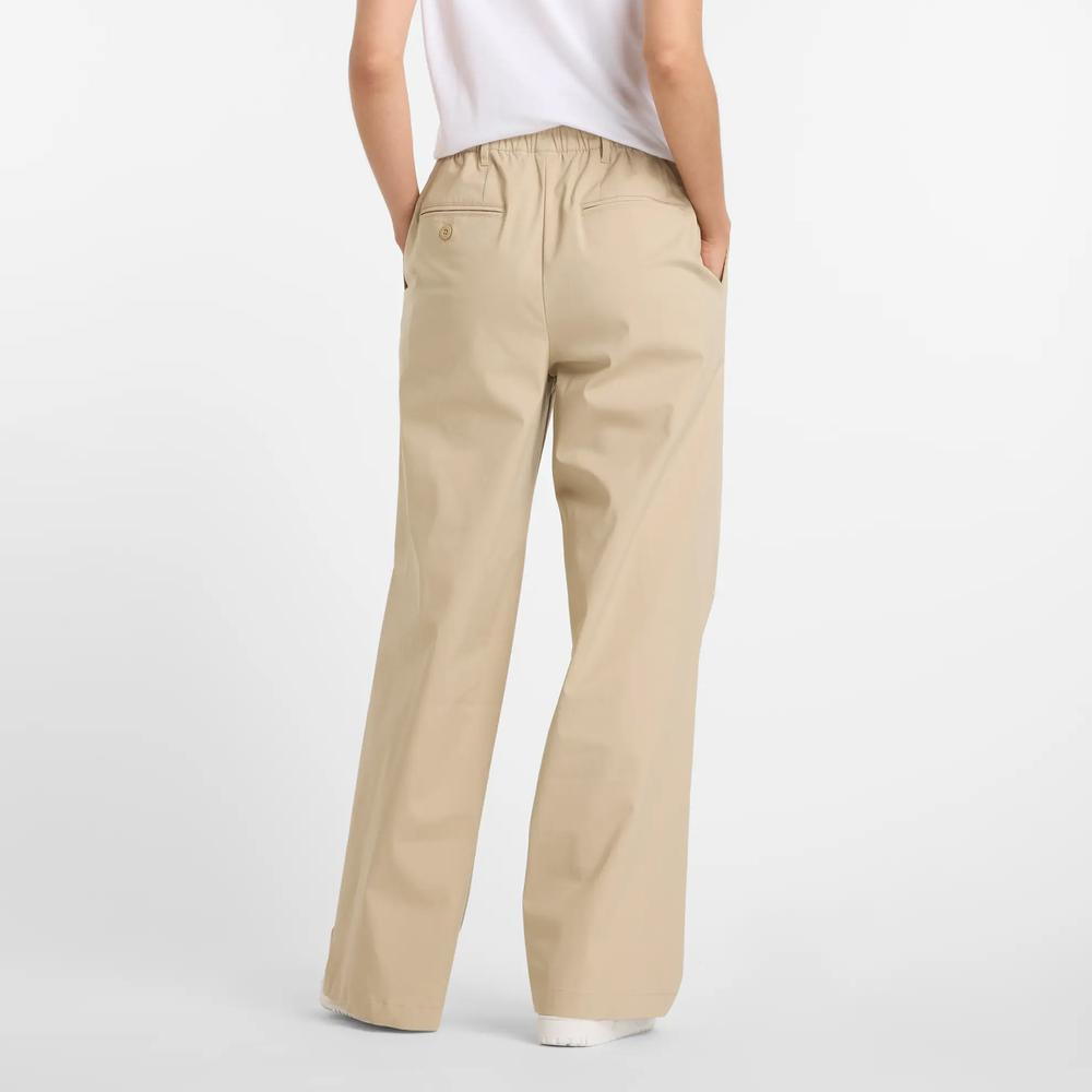Spodnie damskie New Balance WP51538SOT - beżowe