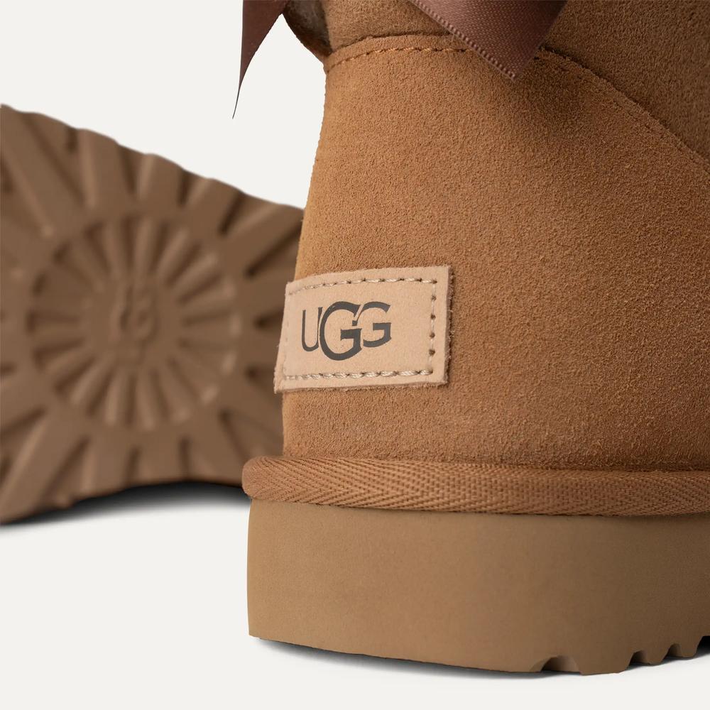 Buty damskie UGG W Mini Bailey Bow II 1016501-CHE - brązowe