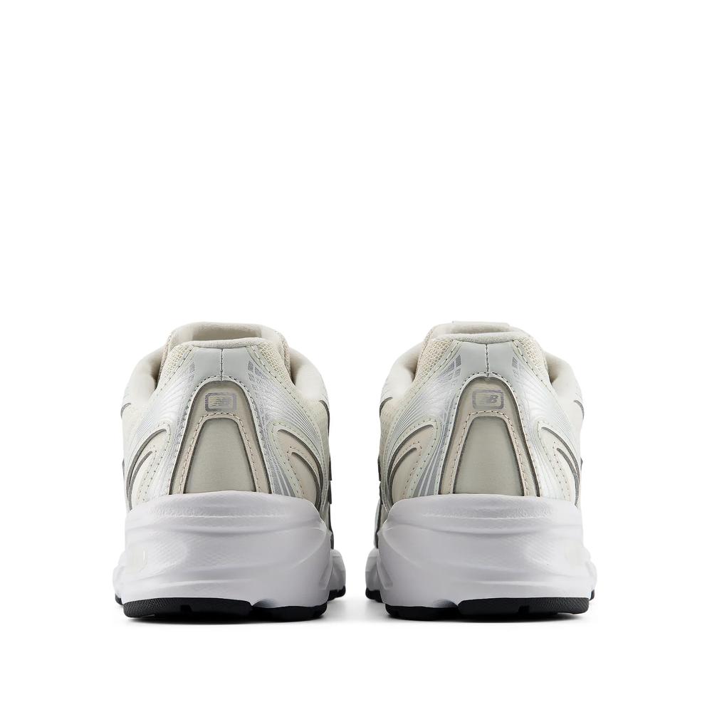 Buty młodzieżowe New Balance G7402A3 - beżowe