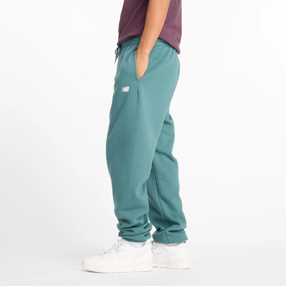 Spodnie New Balance MP41503NUS - niebieskie