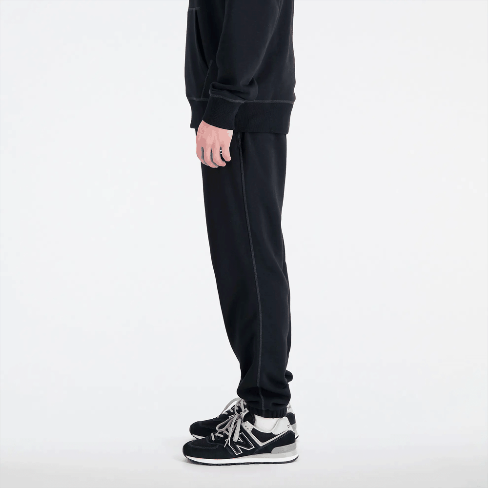 Spodnie New Balance MP33509BK - czarne