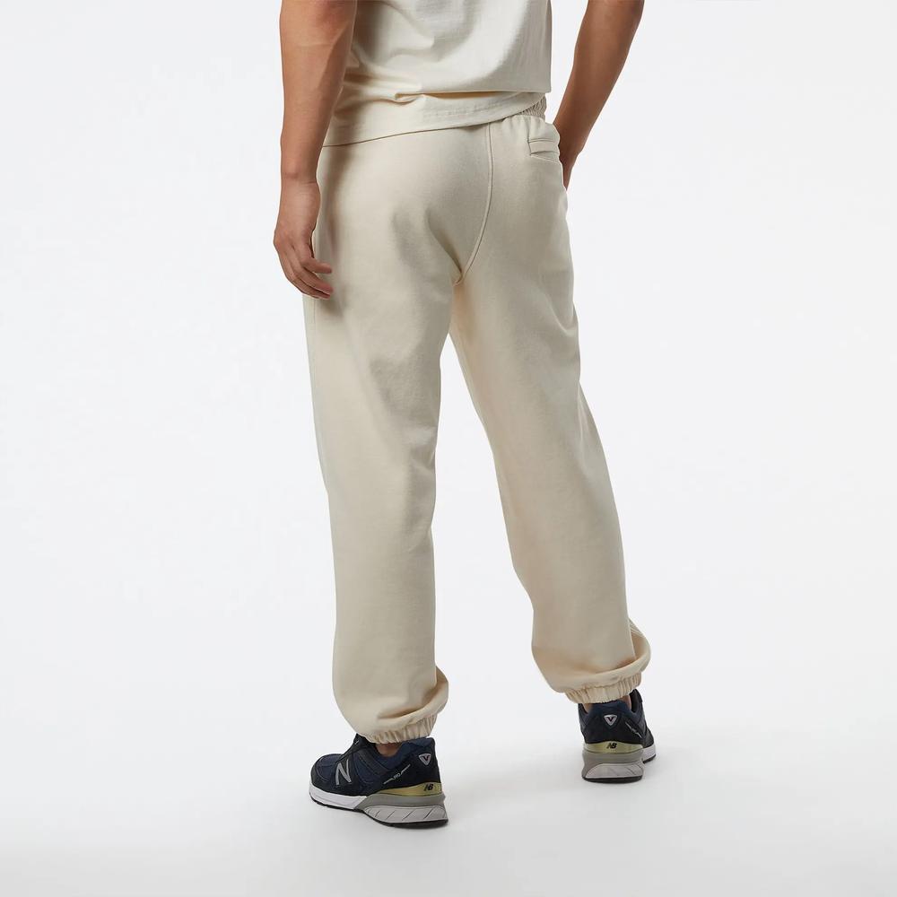 Spodnie dresowe New Balance MP23551GIE - beżowe