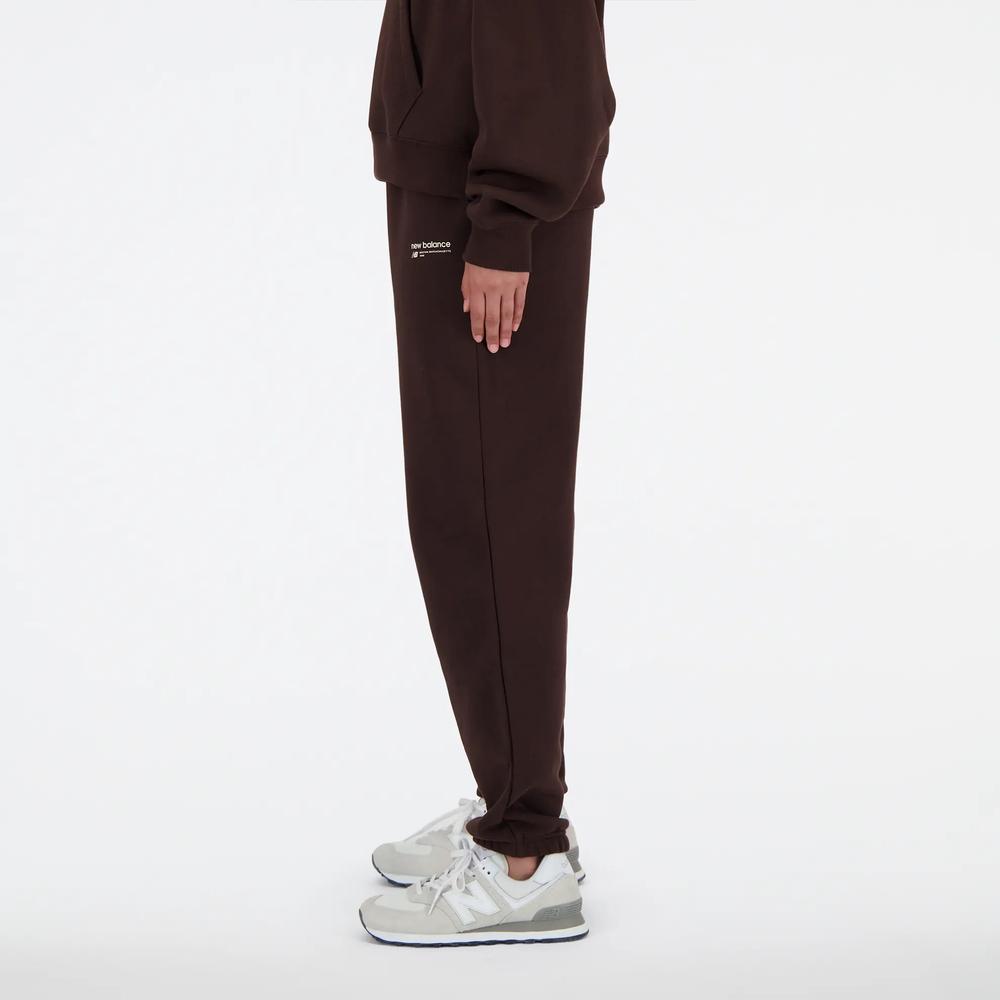 Spodnie New Balance WP33513KCF - brązowe