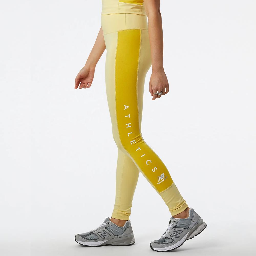 Legginsy New Balance WP23501HCM - żółte