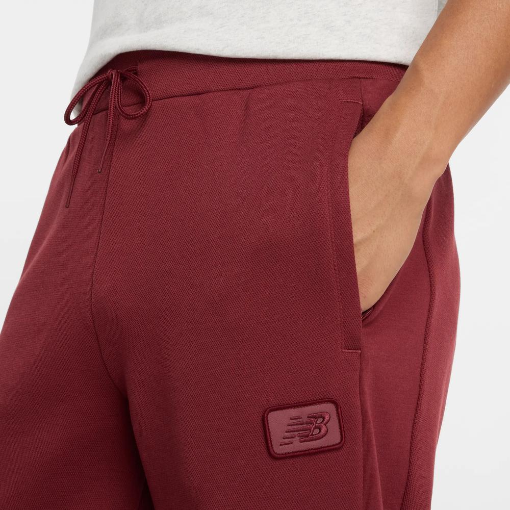 Spodnie męskie New Balance MP53501MHB - bordowe