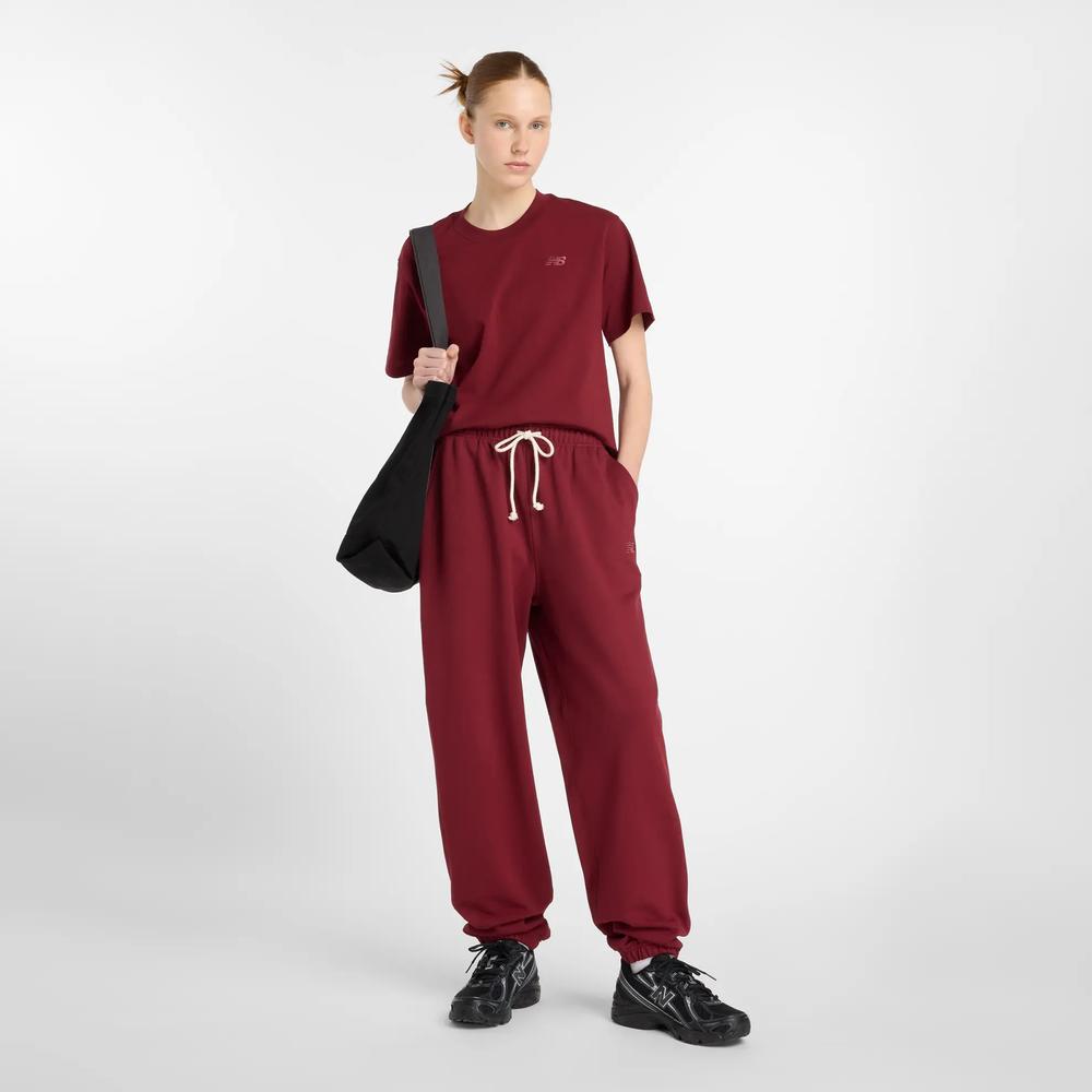 Spodnie damskie New Balance WP41513MHB - bordowe