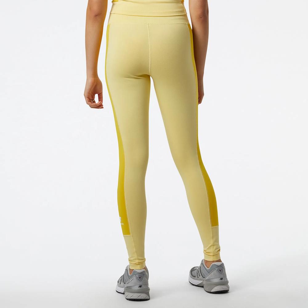 Legginsy New Balance WP23501HCM - żółte