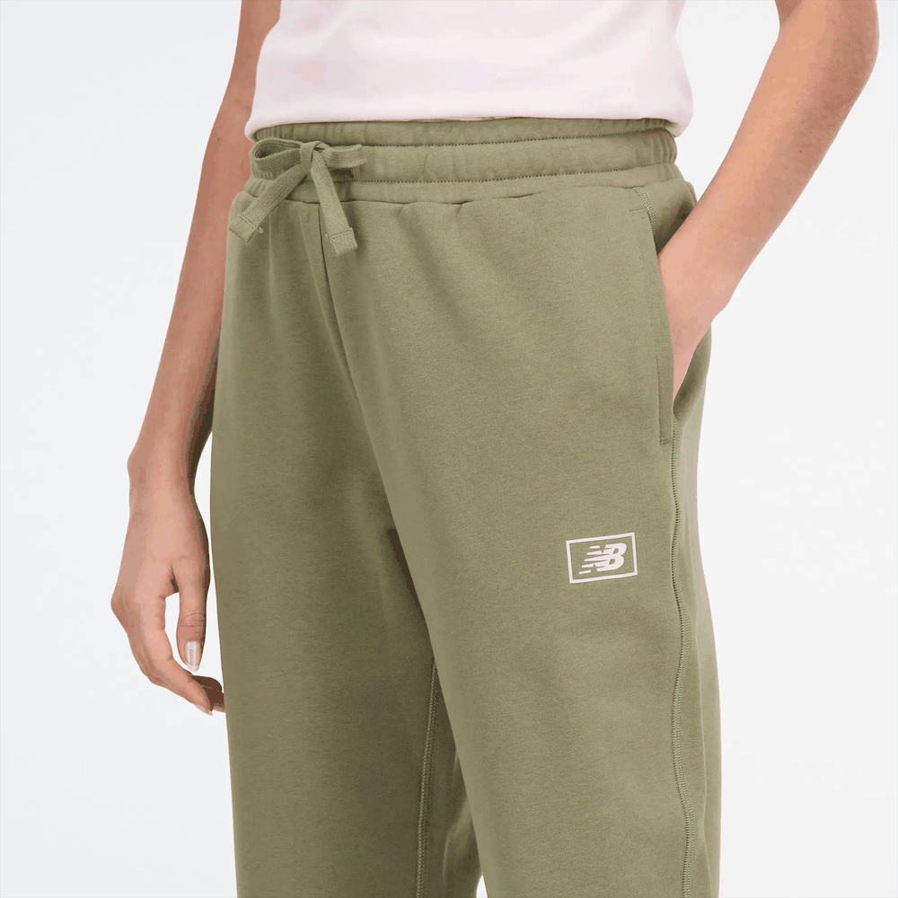Spodnie New Balance WP33508CGN - zielone