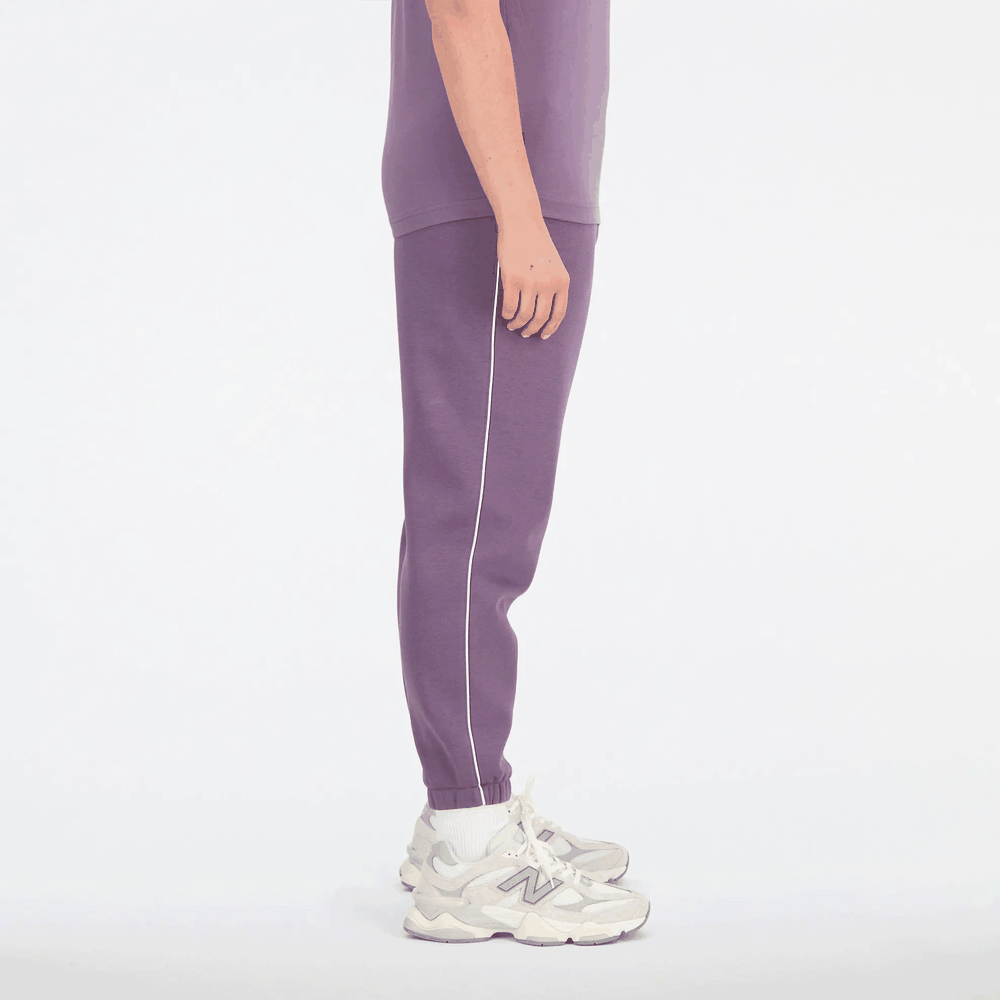 Spodnie New Balance WP33509SHW - fioletowe