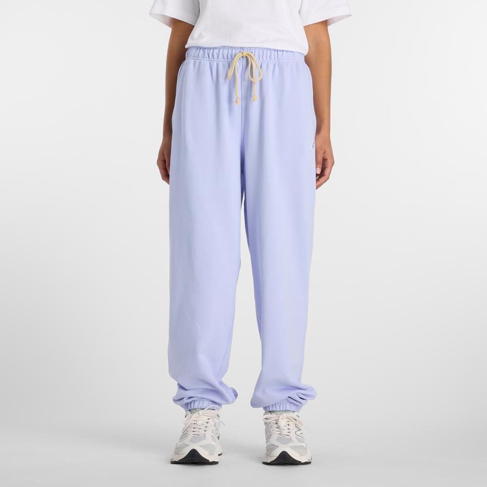 Spodnie damskie New Balance WP41513DYK - fioletowe