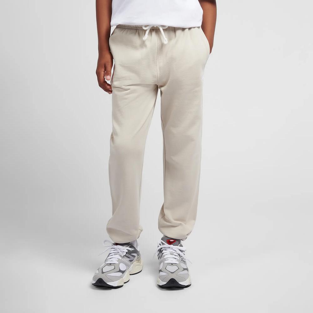 Spodnie dziecięce New Balance LAKB0060TWF - beżowe