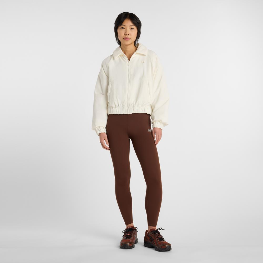 Kurtka damska New Balance WJ61D8YXSST - beżowa