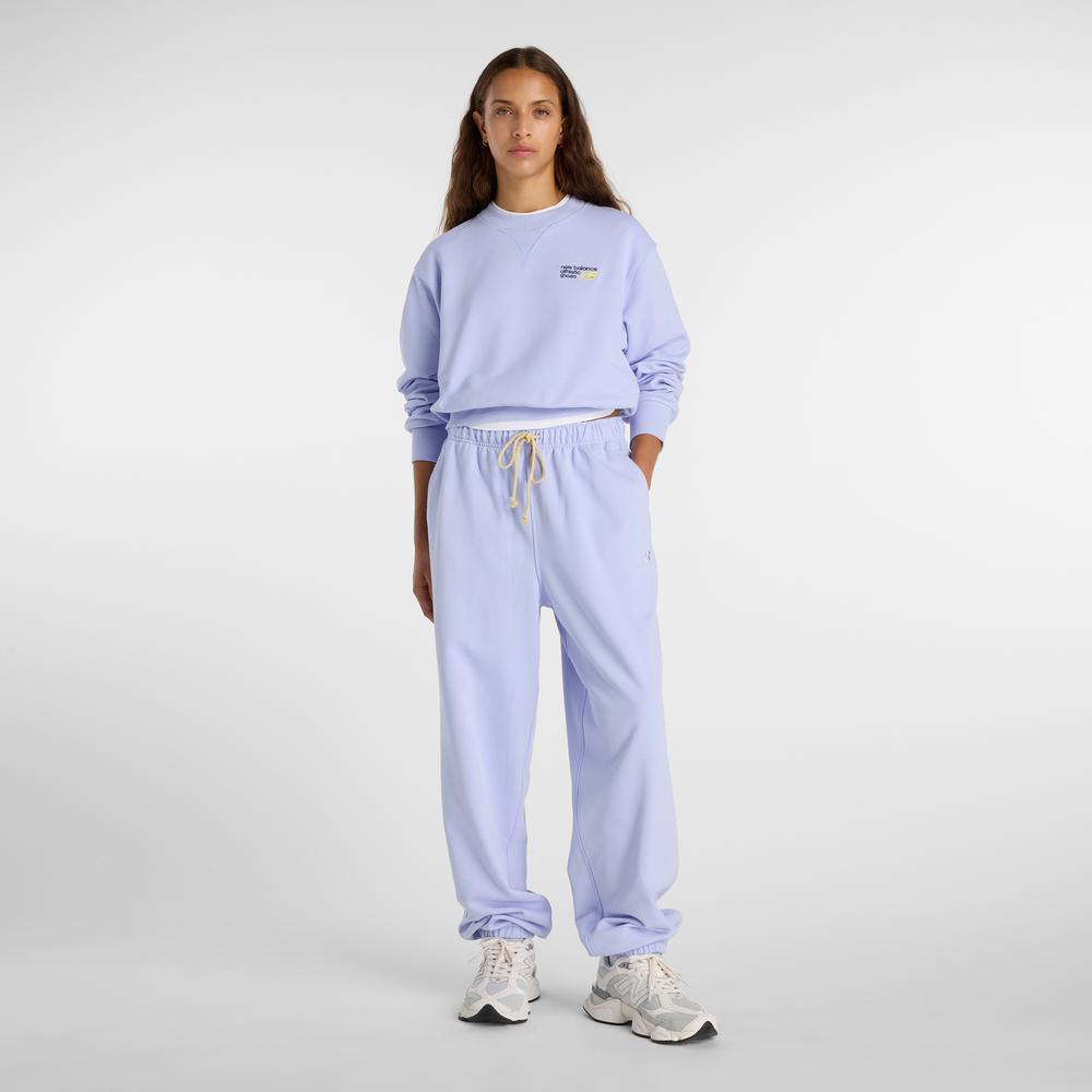 Spodnie damskie New Balance WP41513DYK - fioletowe