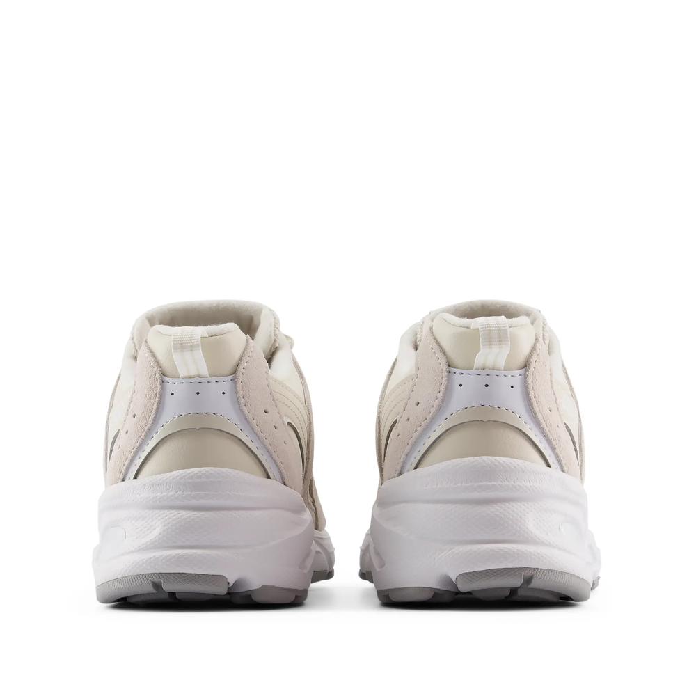 Buty młodzieżowe New Balance G5304V7 - beżowe