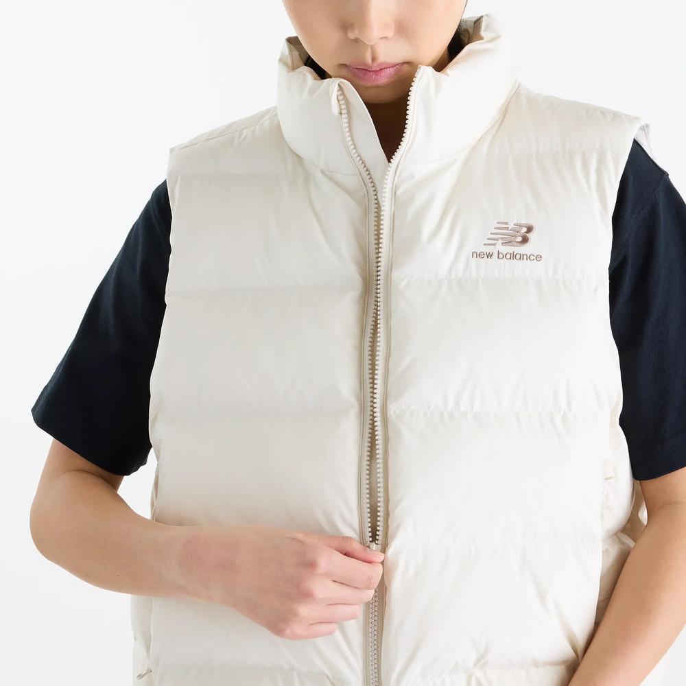 Bezrękawnik damski New Balance Boston Puffer WJ62O4EXLIN - beżowy
