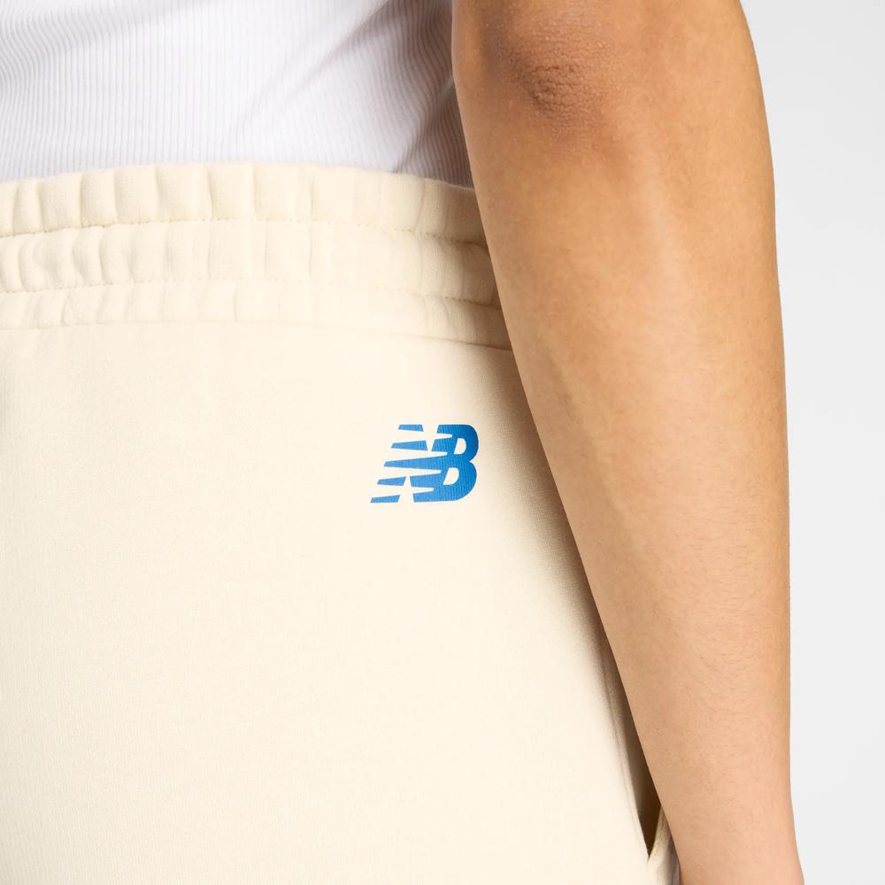 Spodnie damskie New Balance WP53903LIN - beżowe