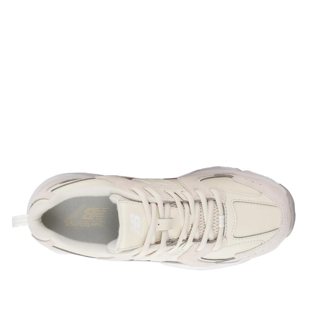 Buty młodzieżowe New Balance G5304V7 - beżowe
