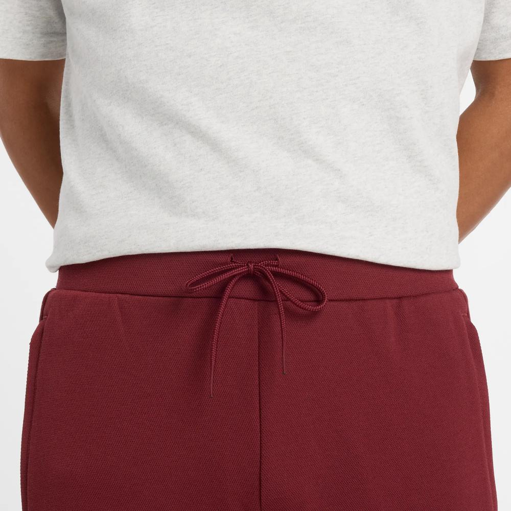 Spodnie męskie New Balance MP53501MHB - bordowe