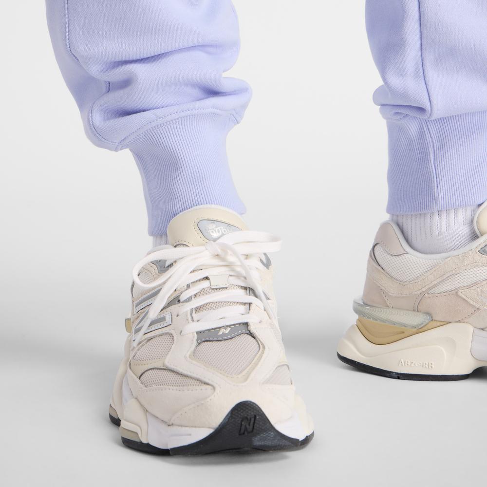 Spodnie damskie New Balance WB61D3EADYK - fioletowe