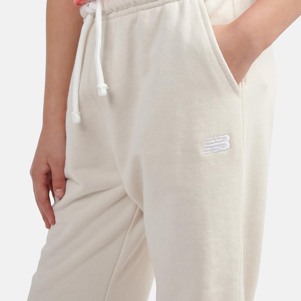 Spodnie dziecięce New Balance LAKG0058LIN - beżowe