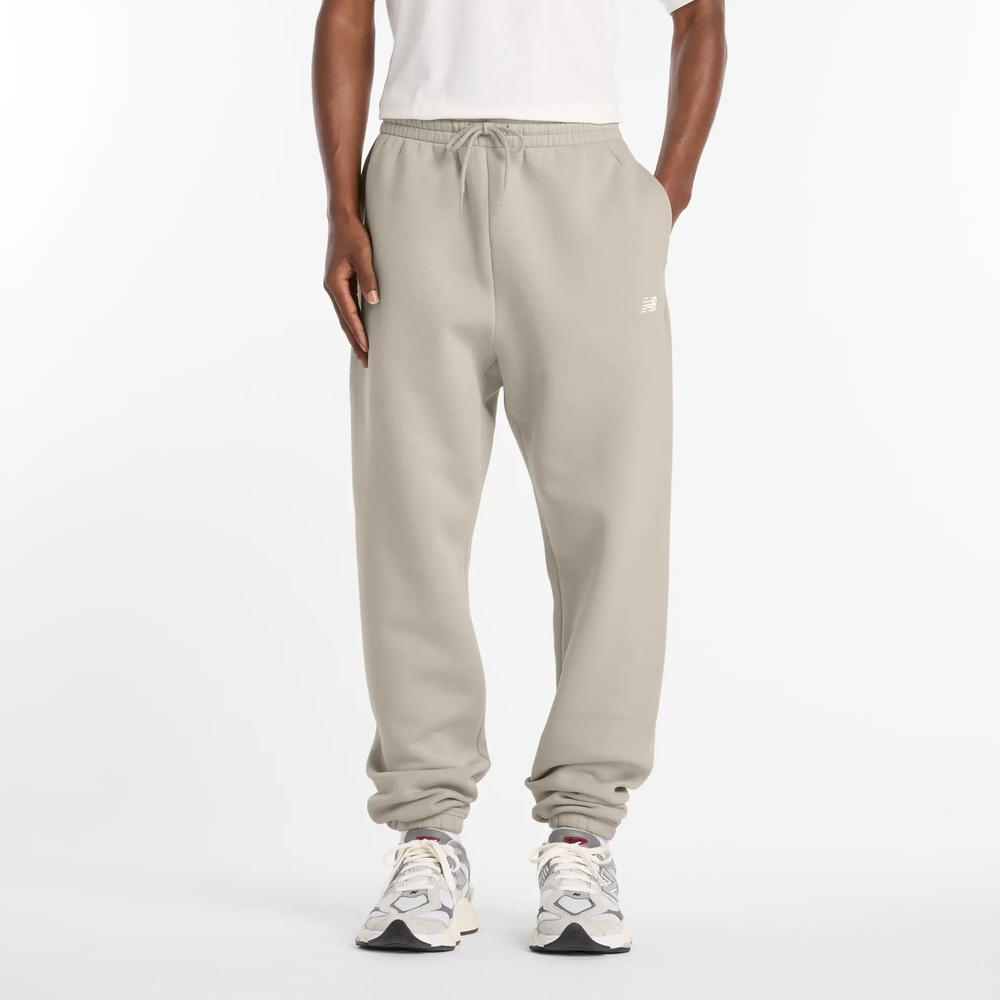Spodnie męskie New Balance MP41503TWF - beżowe