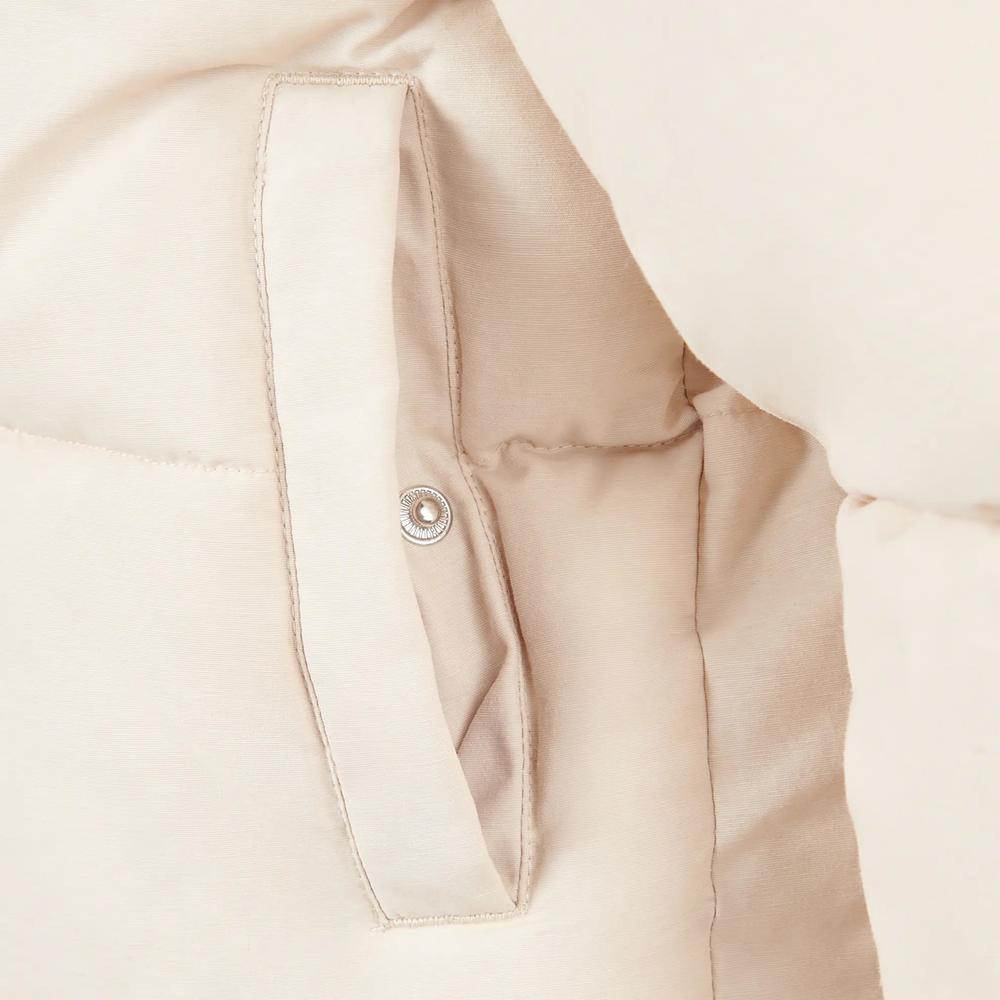 Kurtka dziecięca New Balance LAKG0230BIS - beżowa