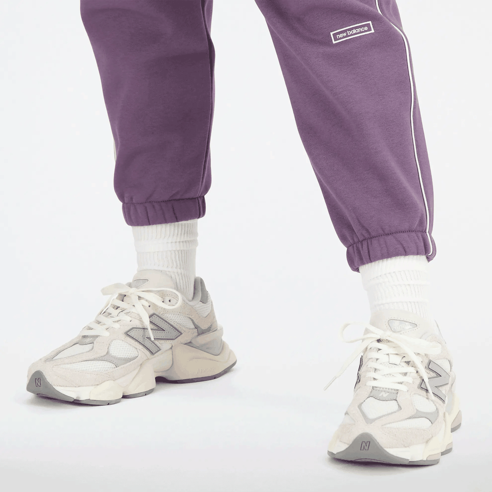Spodnie New Balance WP33509SHW - fioletowe