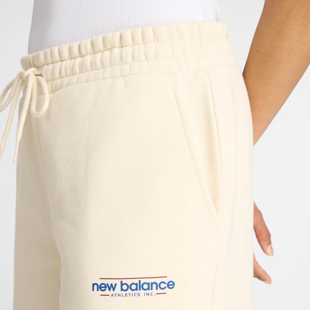 Spodnie damskie New Balance WP53903LIN - beżowe