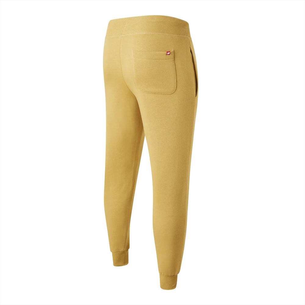 Spodnie New Balance MP23600GHO - żółte