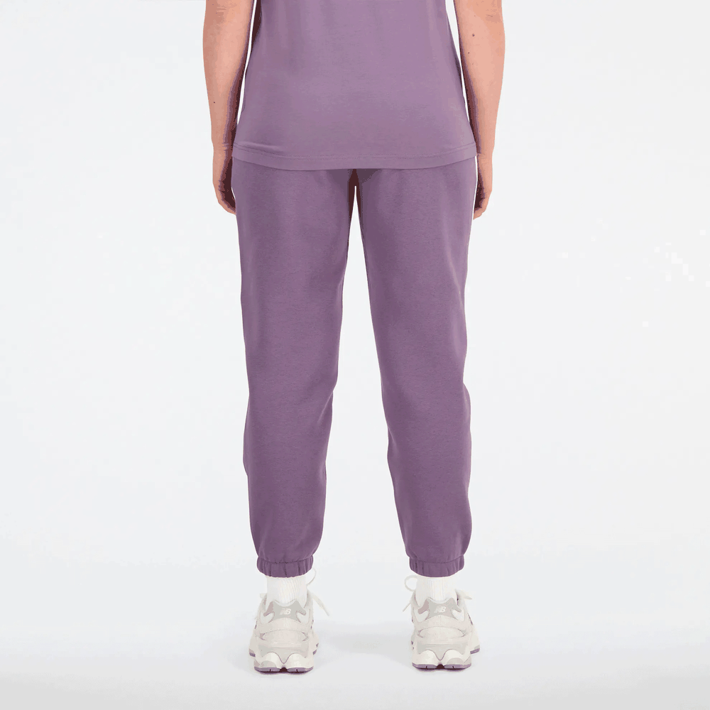 Spodnie New Balance WP33509SHW - fioletowe