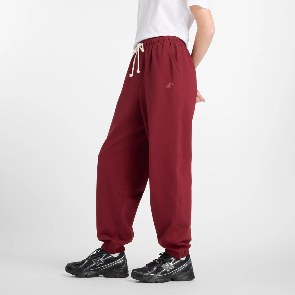 Spodnie damskie New Balance WP41513MHB - bordowe