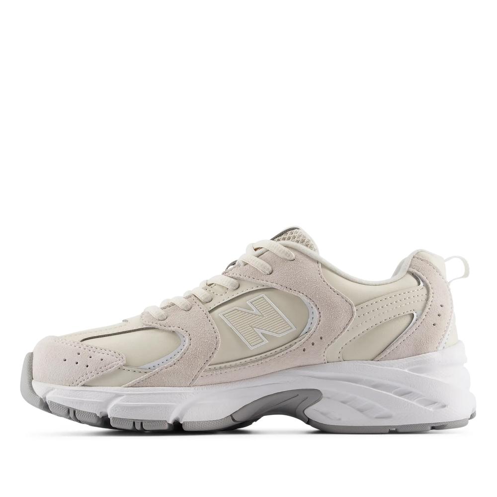 Buty młodzieżowe New Balance G5304V7 - beżowe