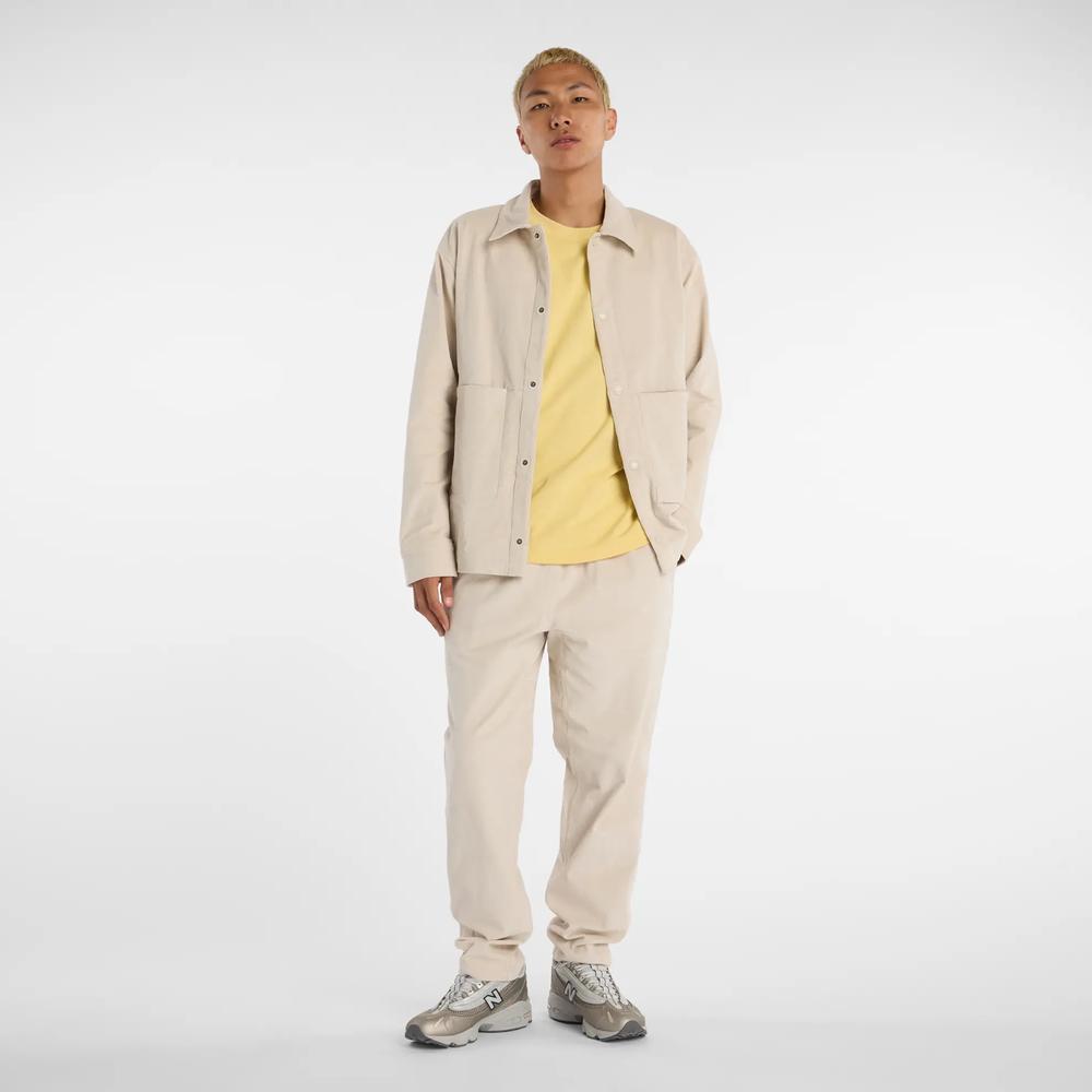 Spodnie męskie New Balance MP53521TWF - beżowe