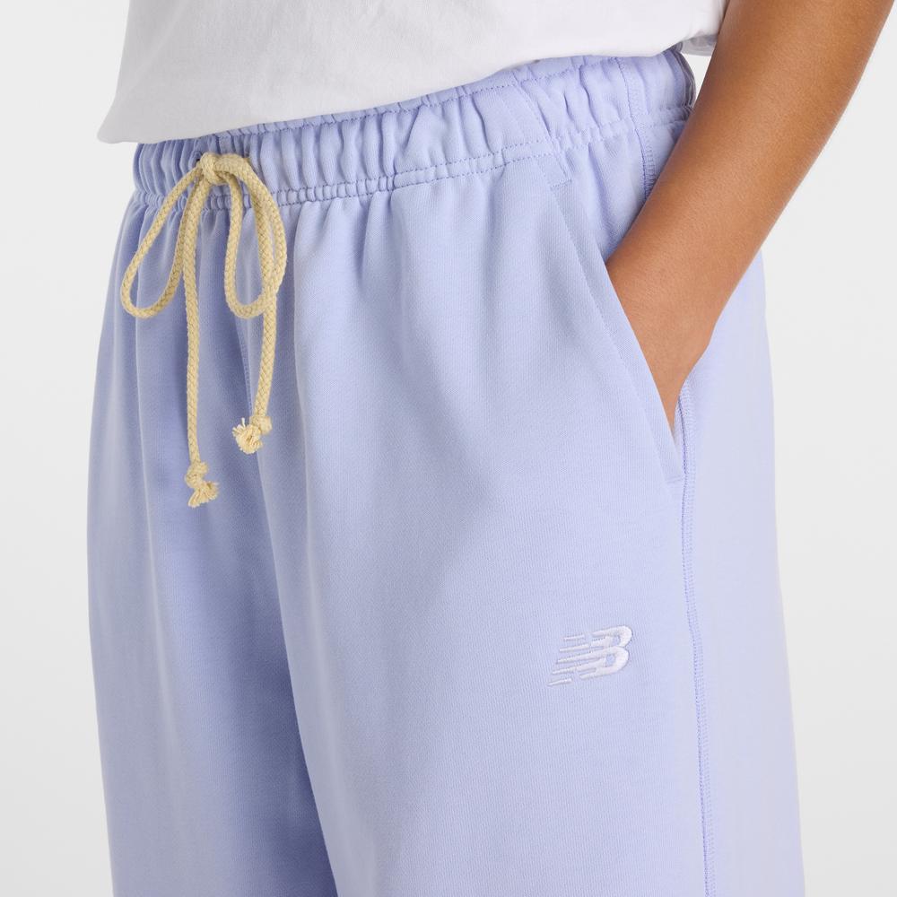 Spodnie damskie New Balance WP41513DYK - fioletowe