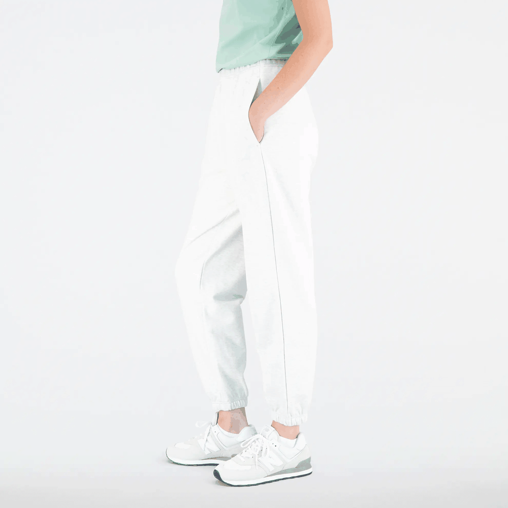 Spodnie New Balance WP31503SAH - białe