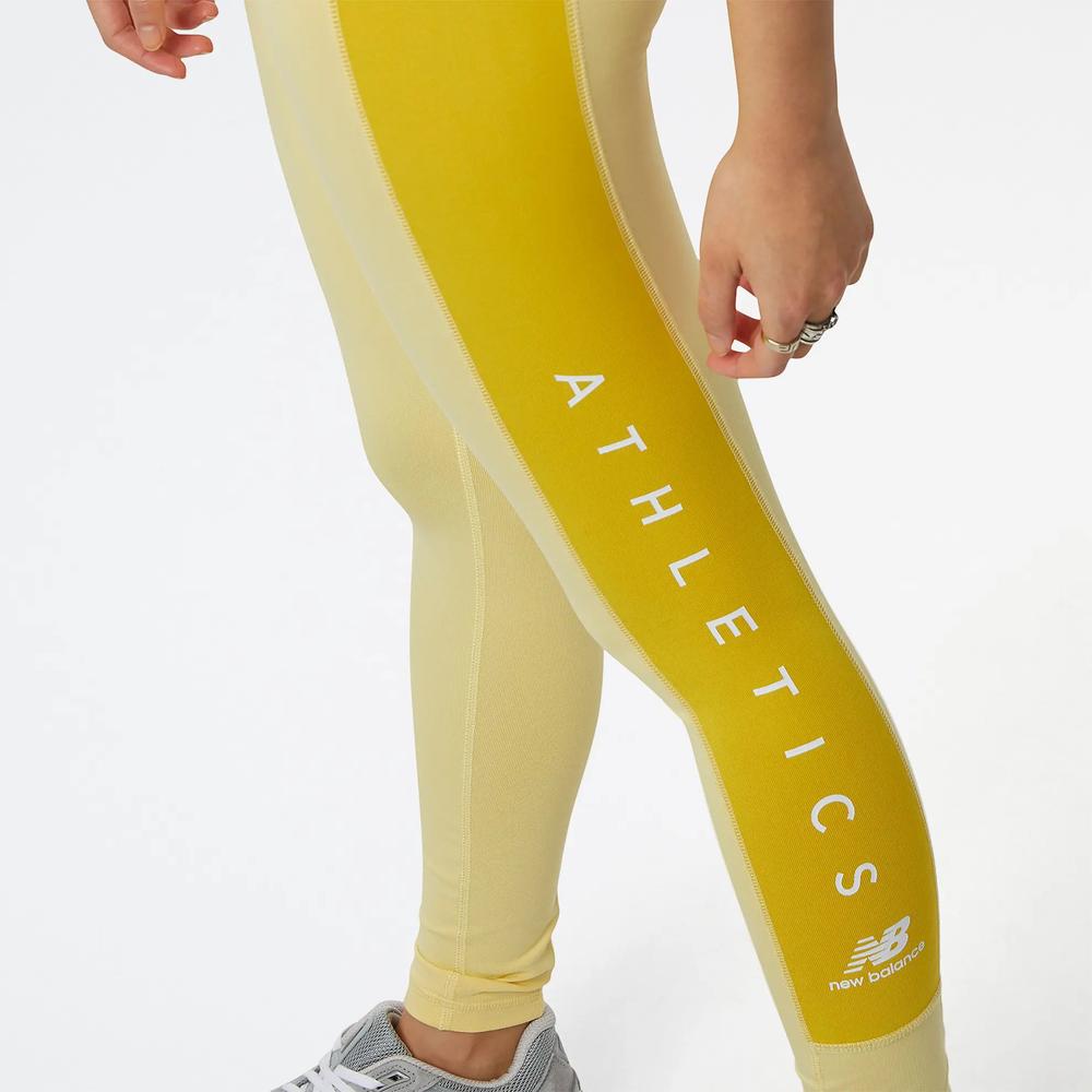 Legginsy New Balance WP23501HCM - żółte