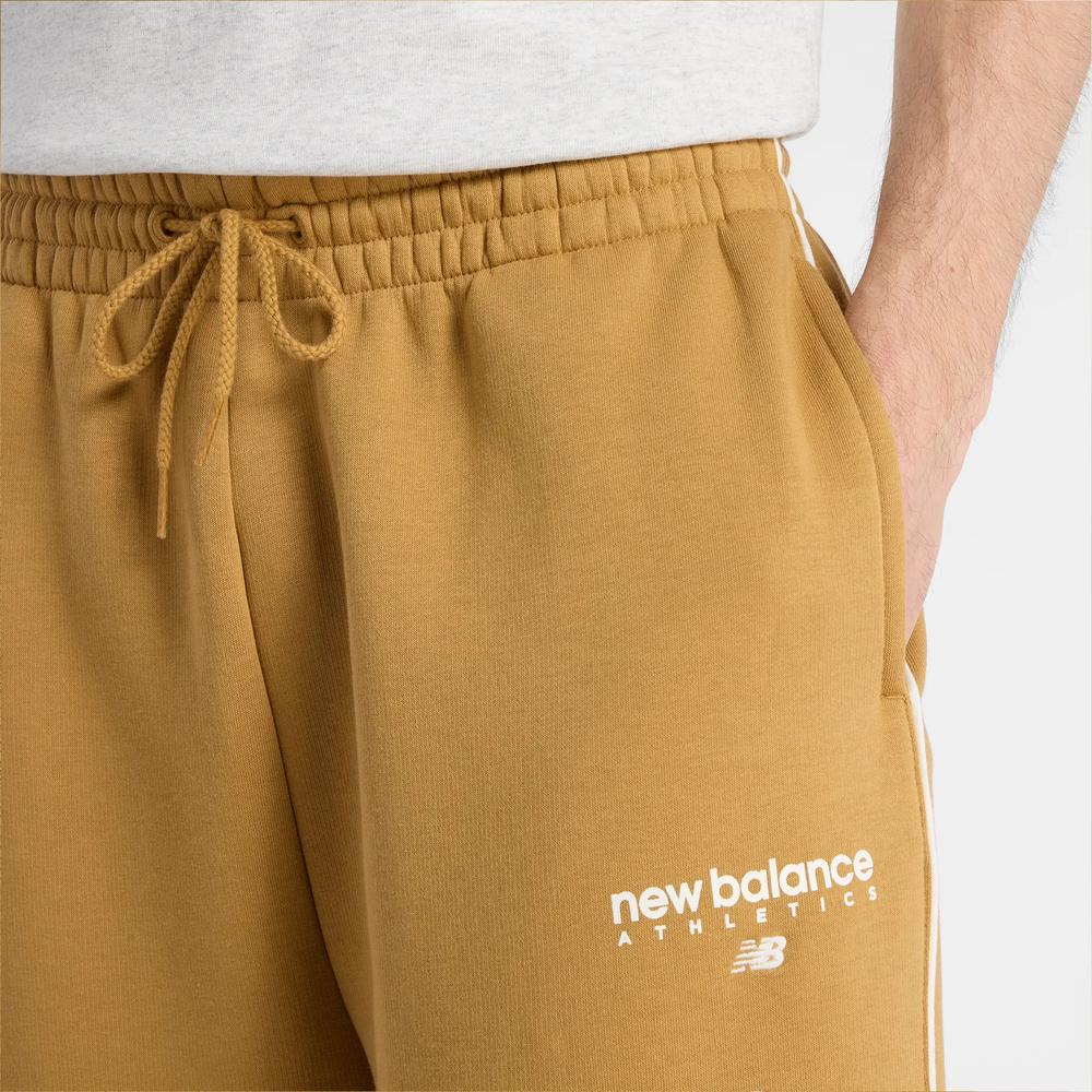 Spodnie męskie New Balance MB61M77EABG - pomarańczowe