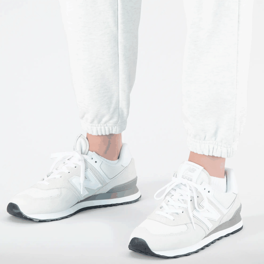 Spodnie New Balance WP31503SAH - białe