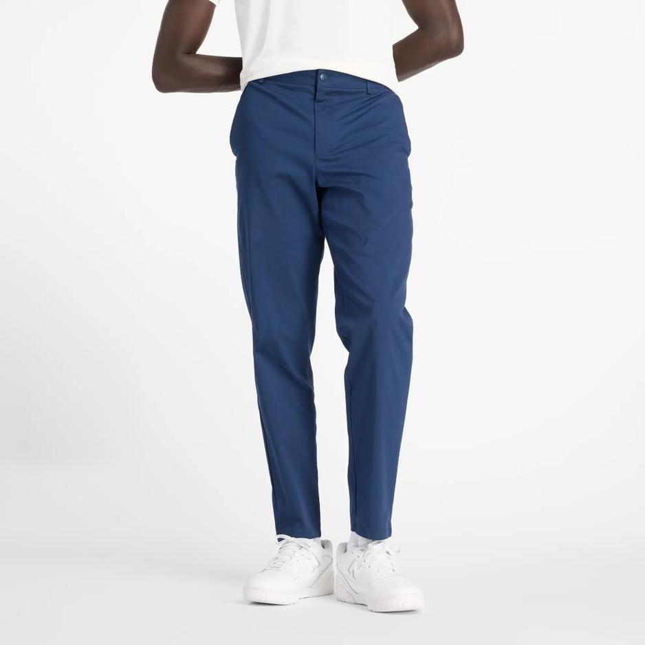 Spodnie New Balance MP43554NNY - granatowe