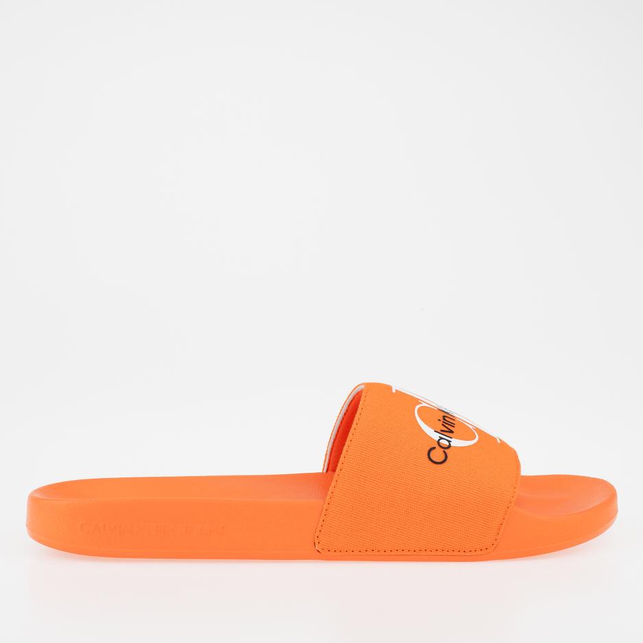 Klapki Calvin Klein Slide Monogram CO YM0YM00061-0JG - pomarańczowe