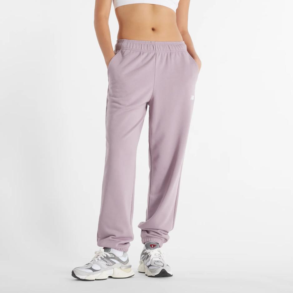 Spodnie New Balance WP41500ICW - różowe